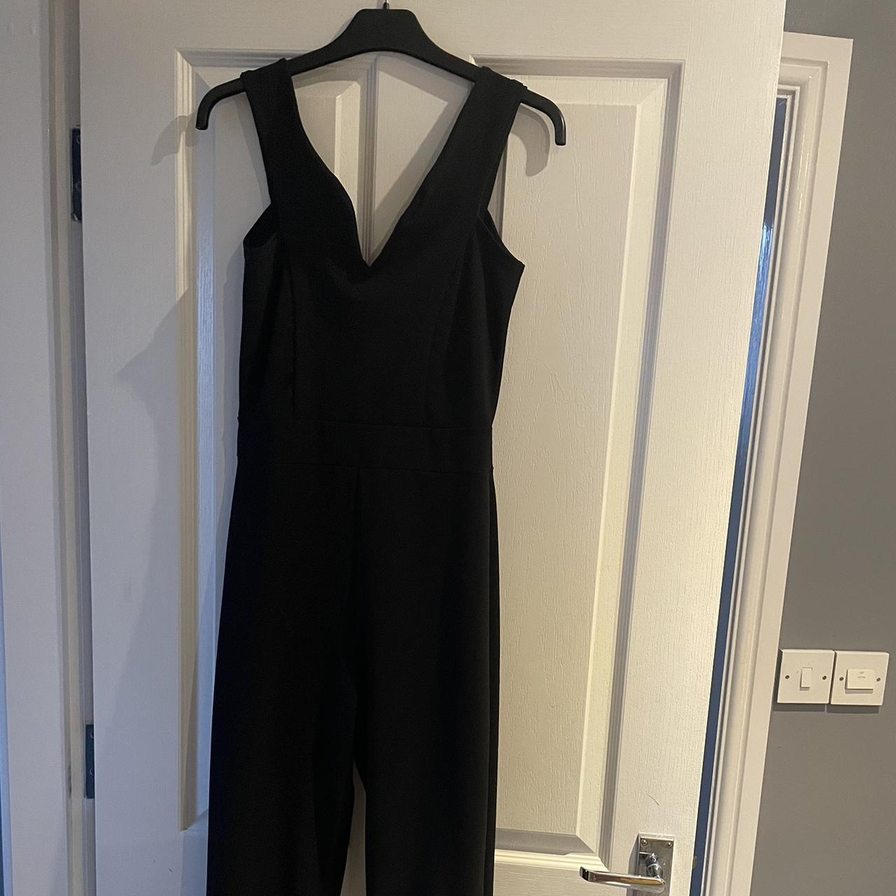 Quiz jumpsuit- off the shoulder but hard to see on... - Depop