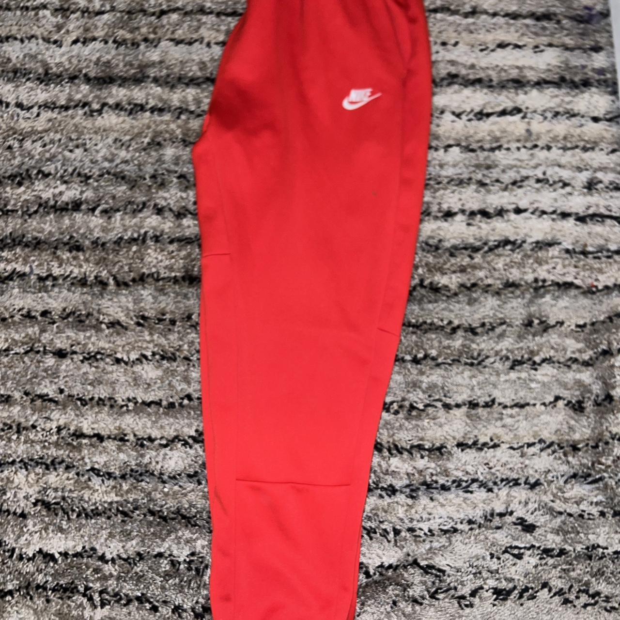 red and white nike jumpsuit