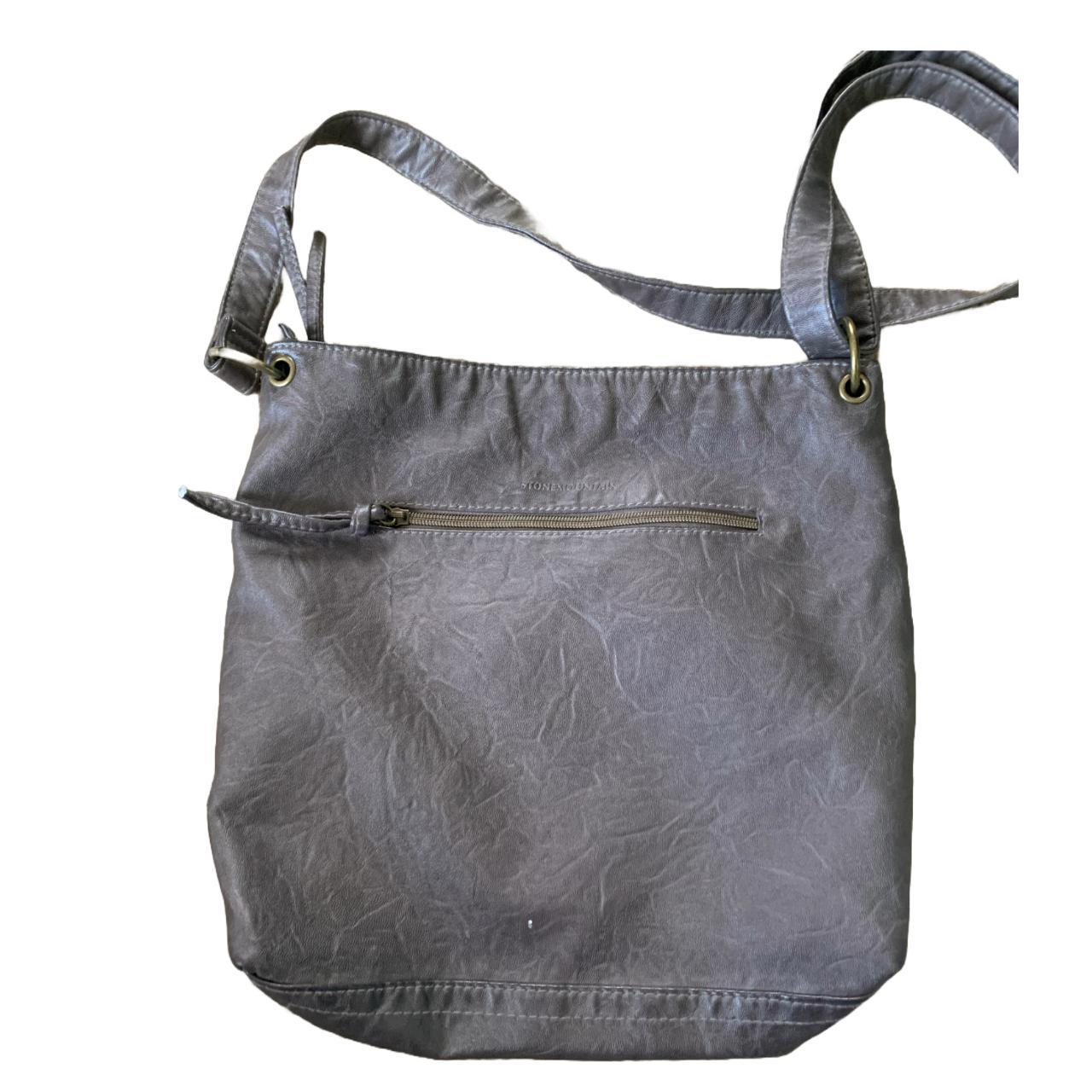 Stone Gray bag, straps are adjustable. 4 pockets on... Depop