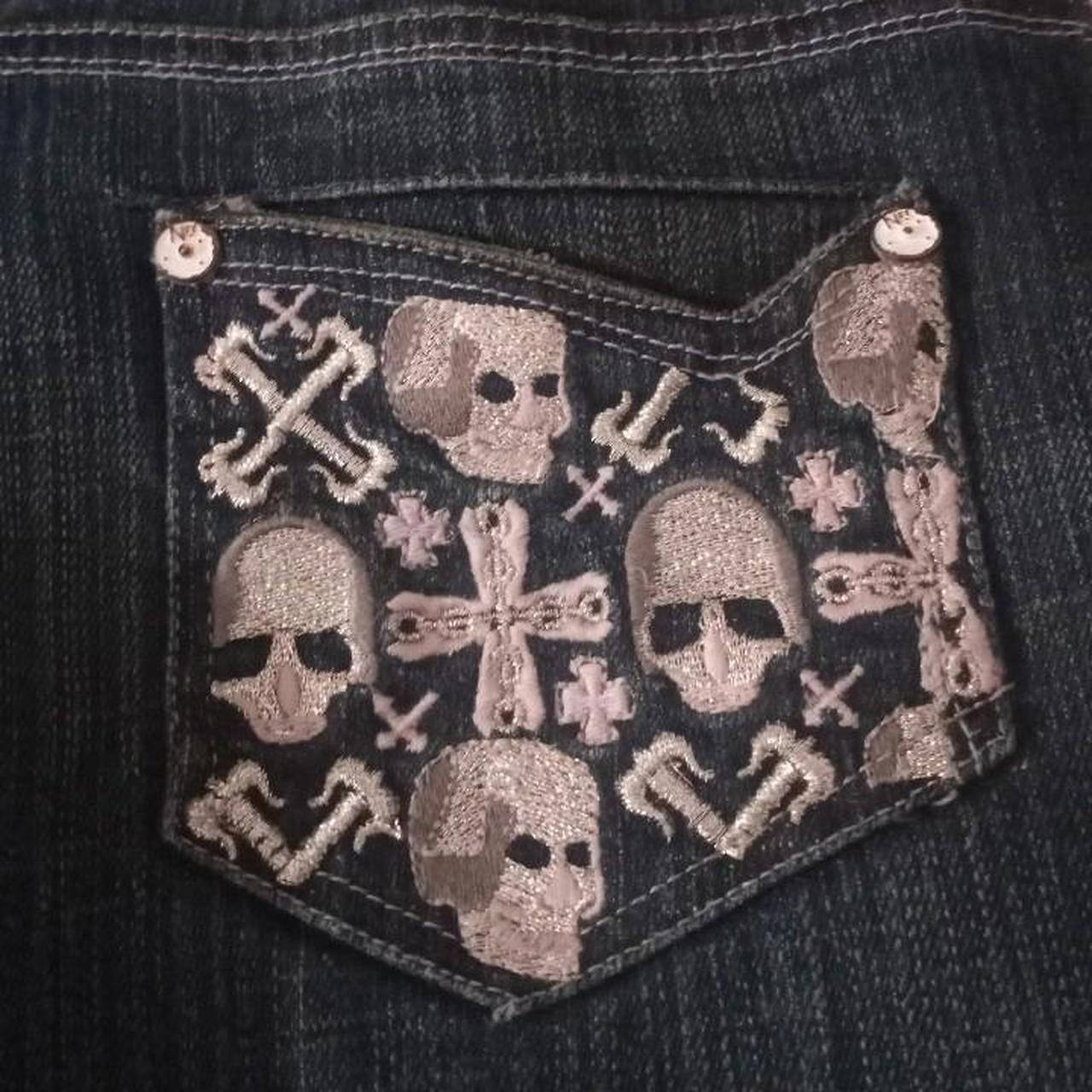 lowrise jeans with skulls/crosses on the back.I fell... - Depop