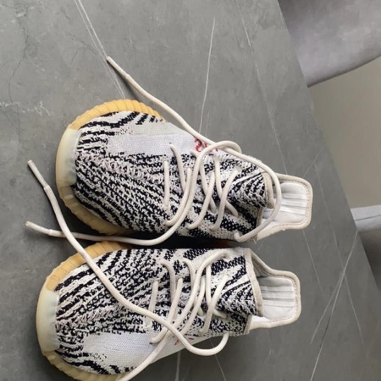 worn yeezy zebra