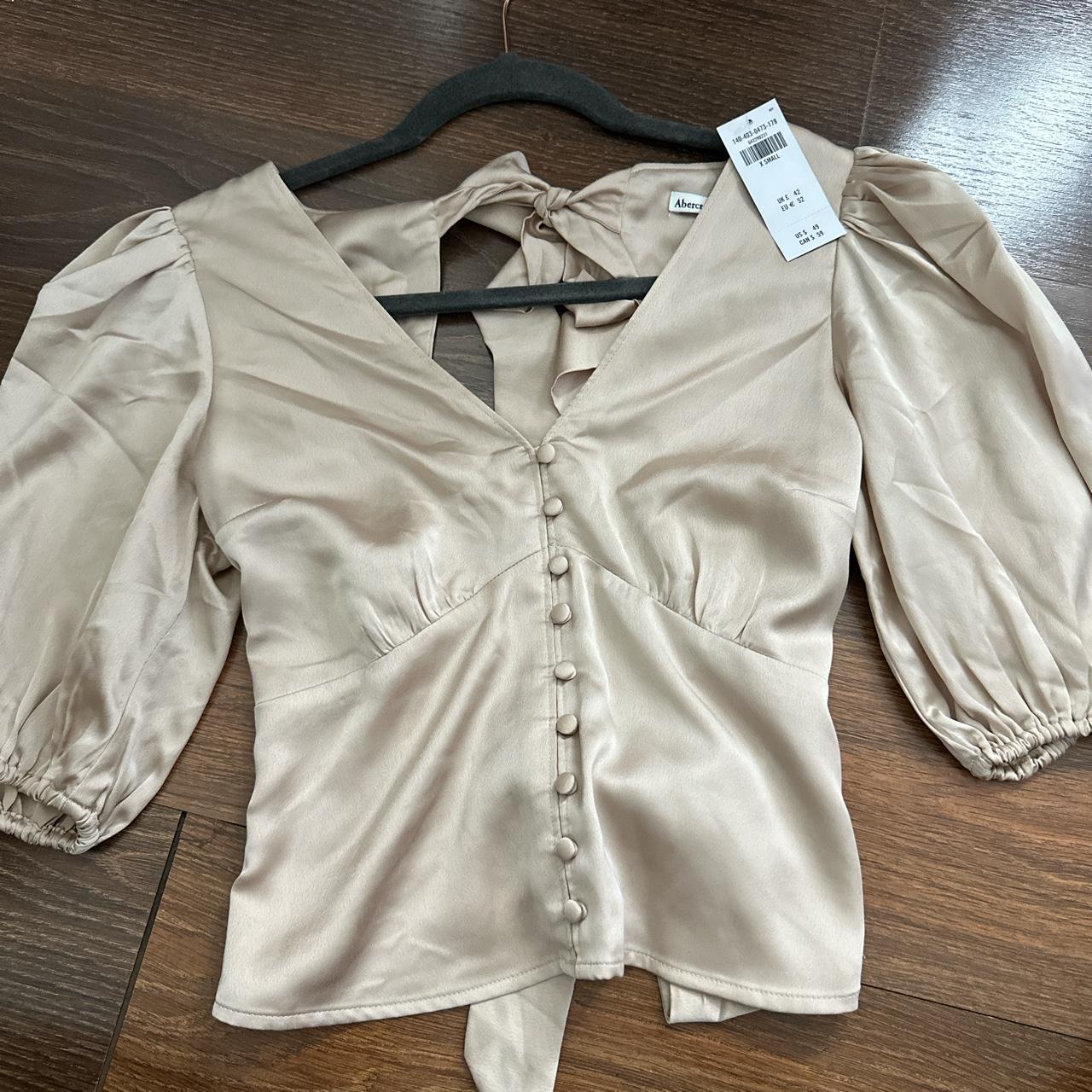 Abercrombie satin top in champagne color with open...