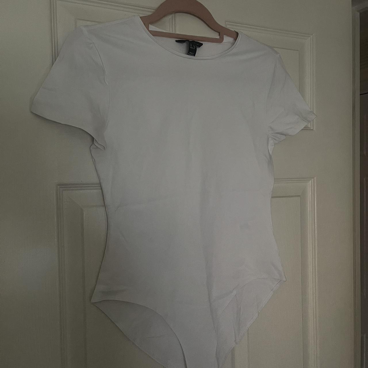 New look short sleeve white bodysuit never worn... Depop