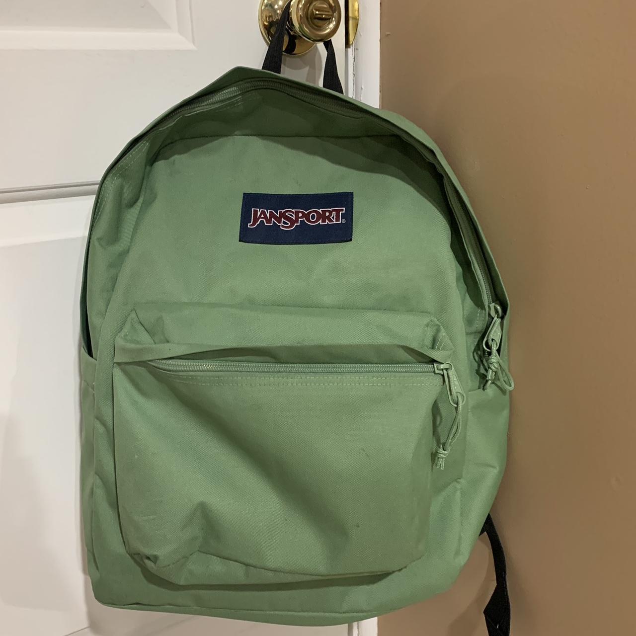 Green Jansport backpack with a few small stains - Depop