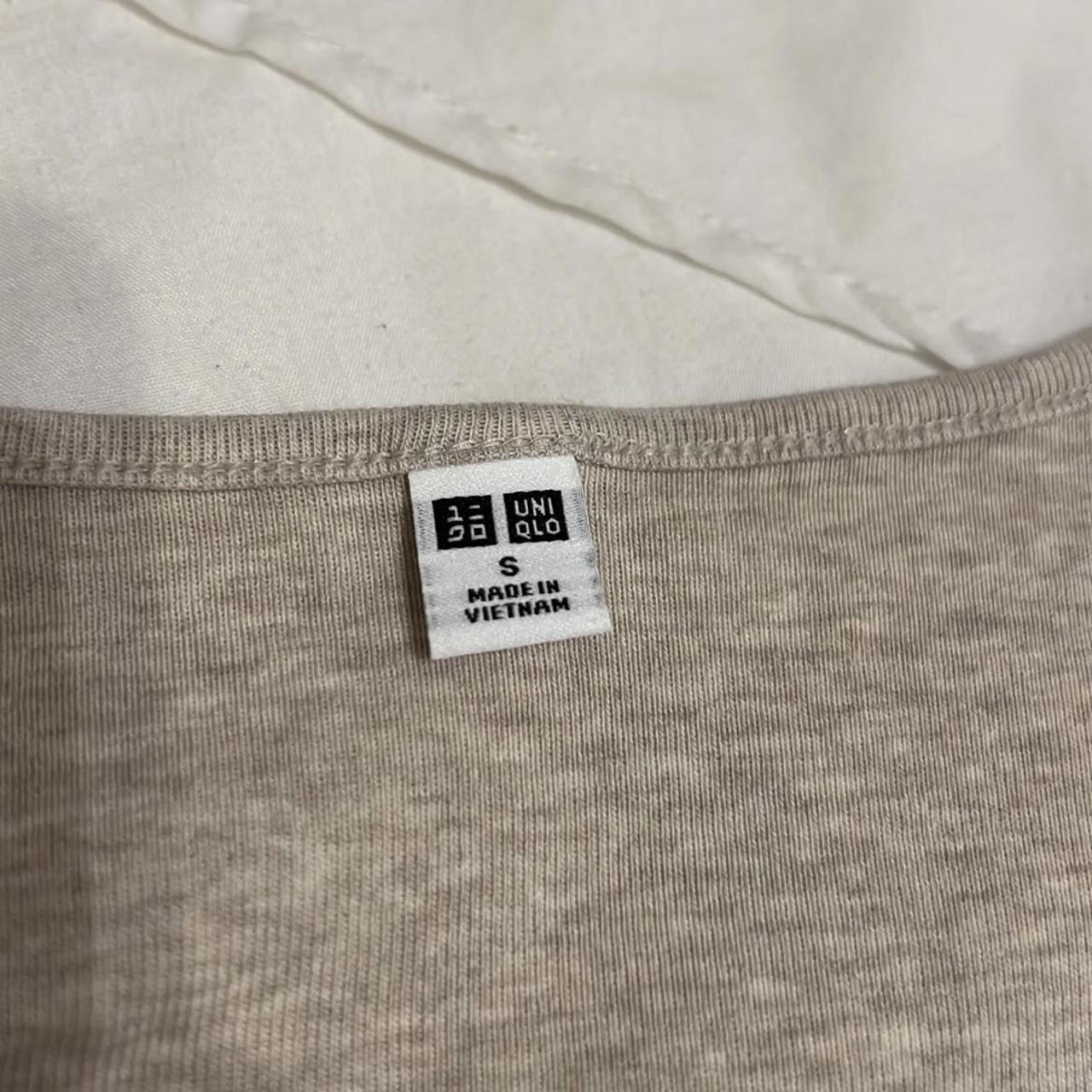 Uniqlo beige crop top. Size Small. Worn once. - Depop