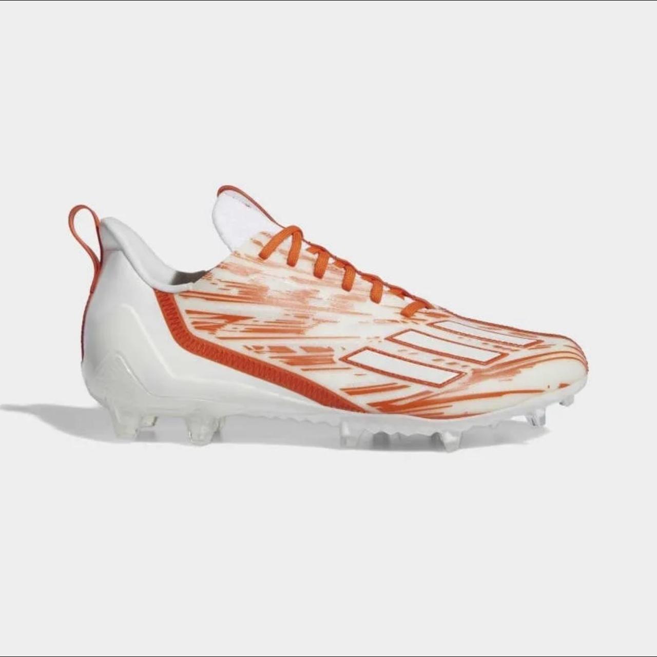 Orange mens football cleats hotsell