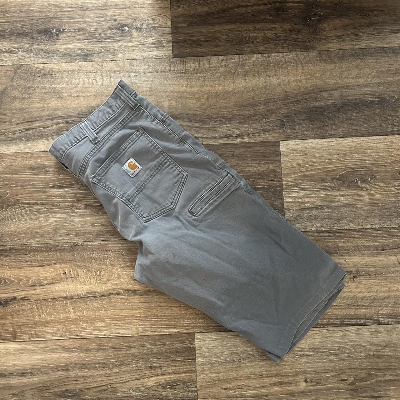 Grey Carhartt pants. Have been hemmed short, could... Depop