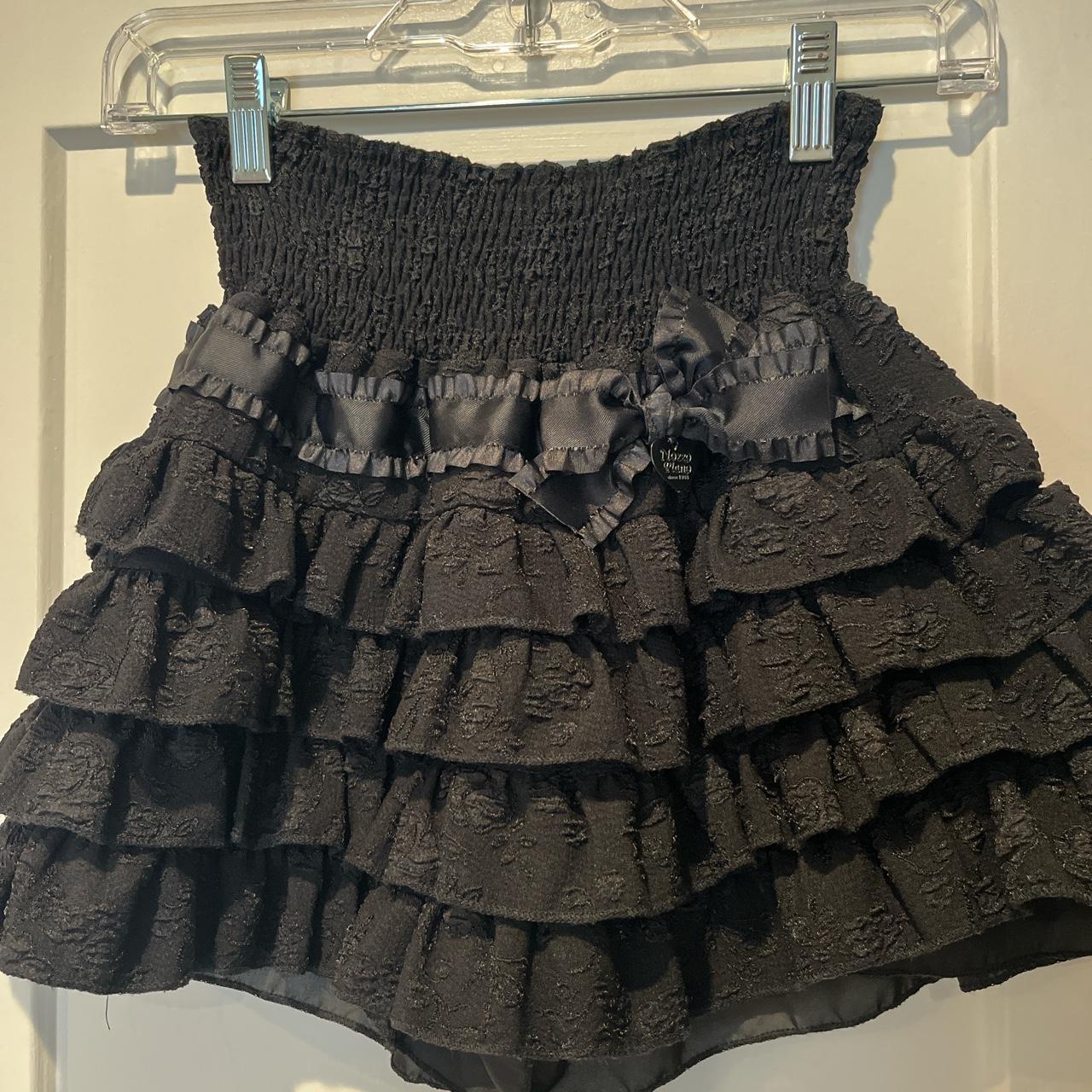 Black mini skirt with bow detailing in the... - Depop