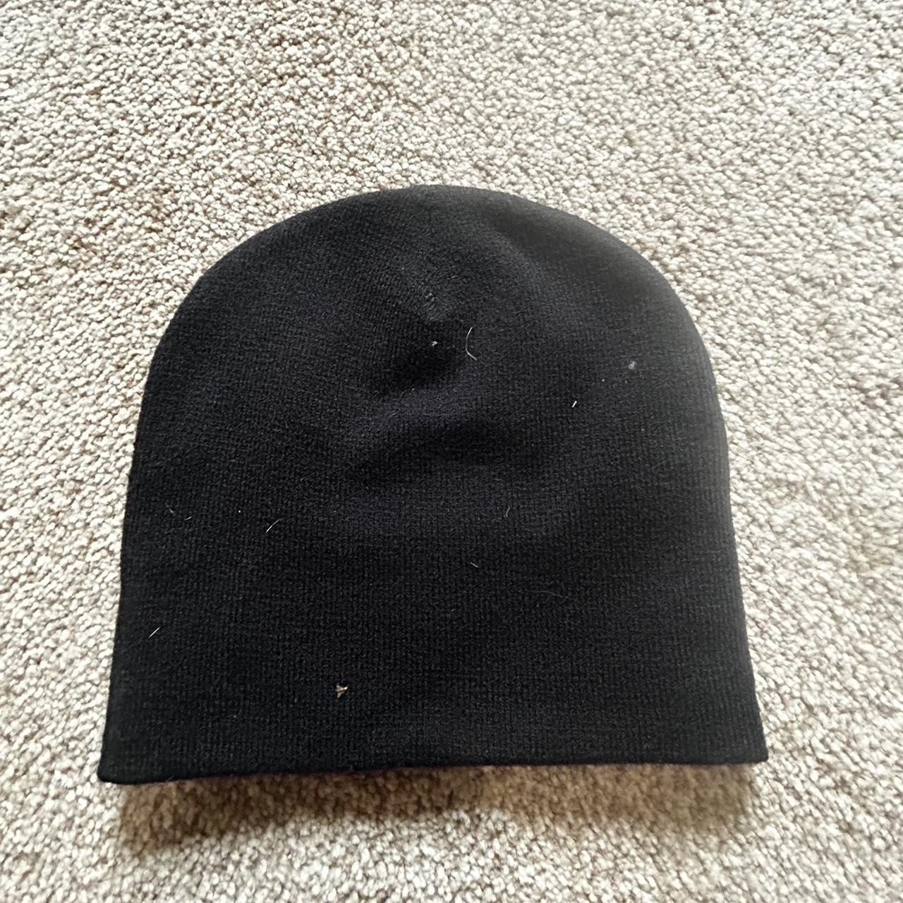 Black and white beanie with red accent. Dm for more... Depop