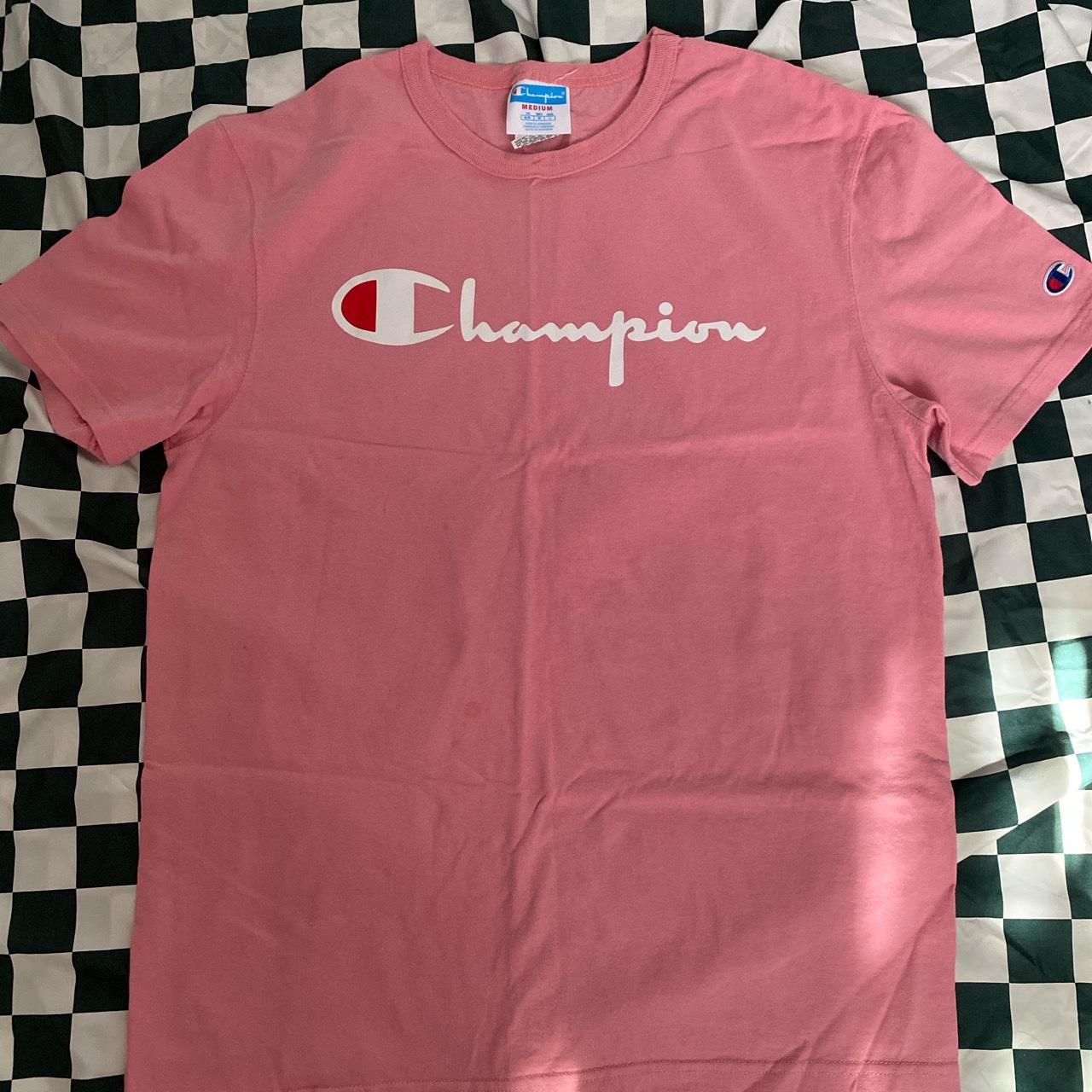 Medium, pink champion shirt, very small stain in the... - Depop