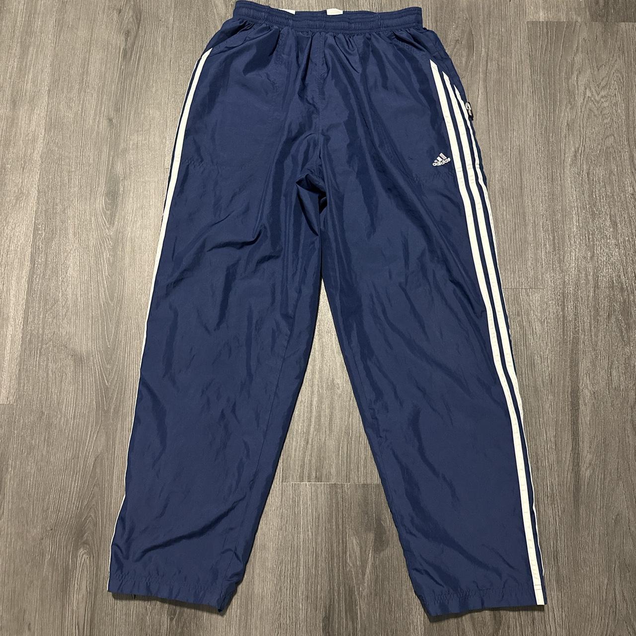 Vintage adidas track pants in good condition with a... - Depop
