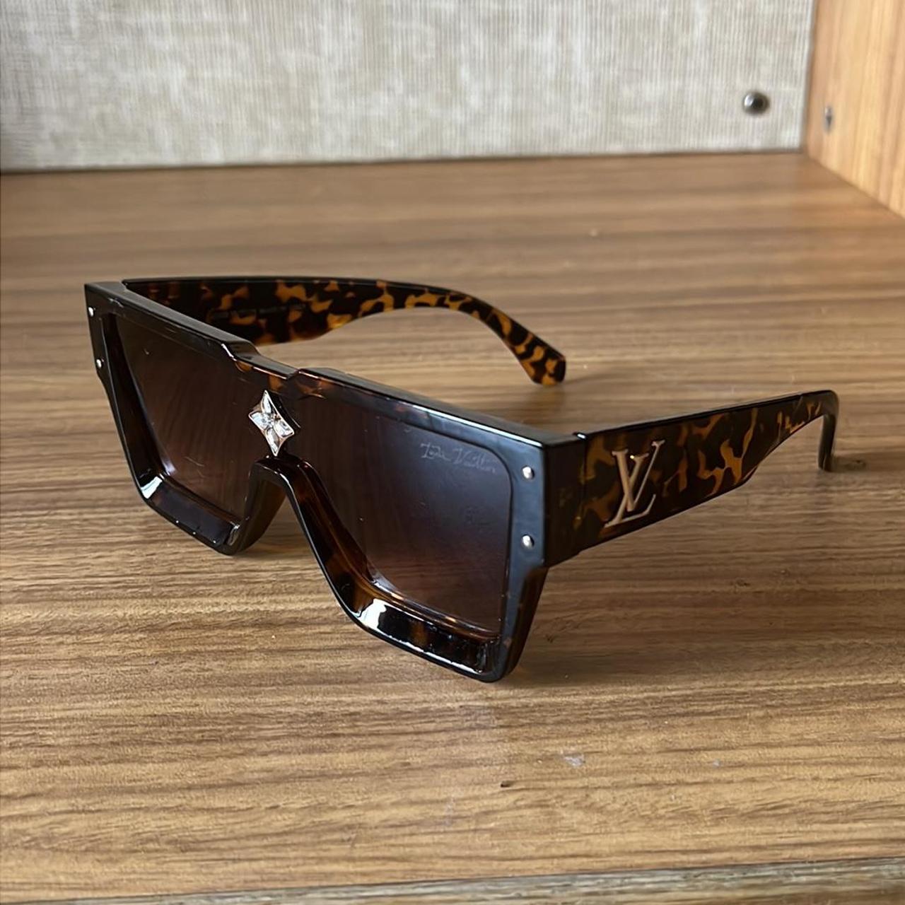 Authentic Louis Vuitton Sunglasses. Normal signs of - Depop