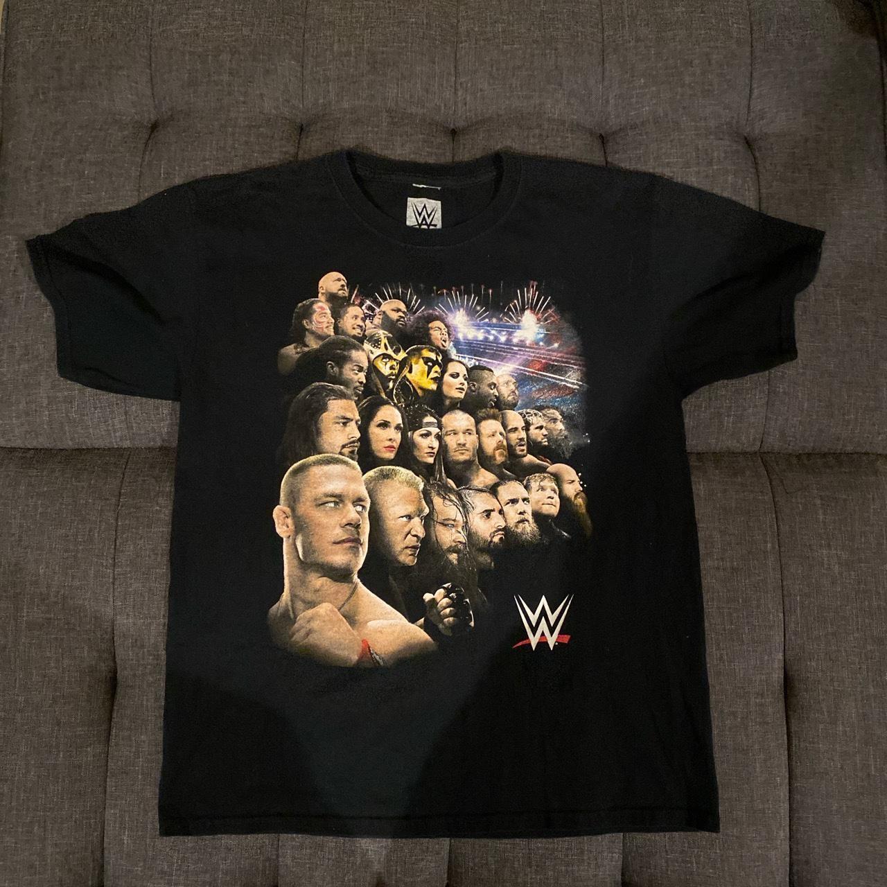 WWE tee from 2014 size Large ripped tag #thrift #WWE... - Depop