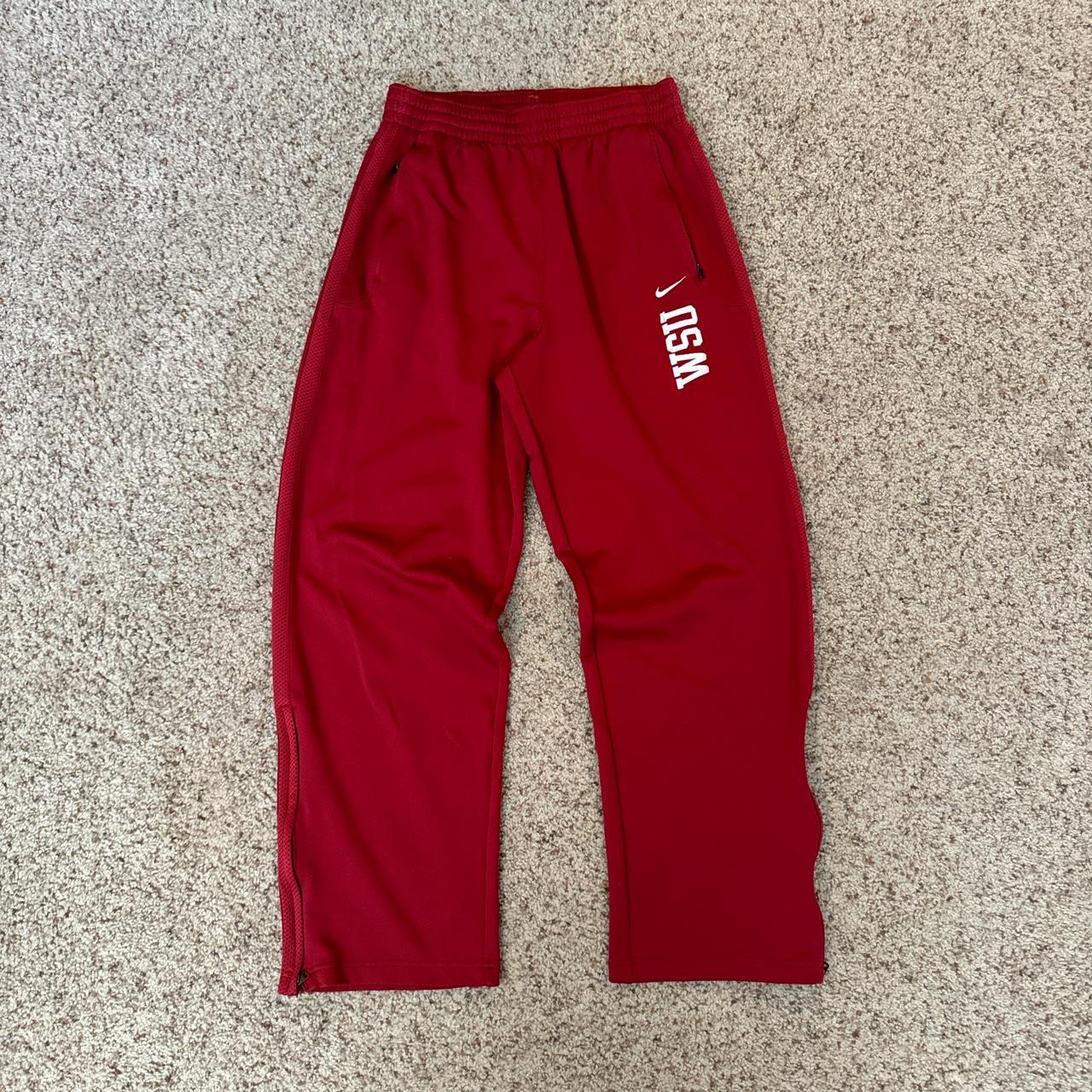 Baggy red Nike pants size L - Depop