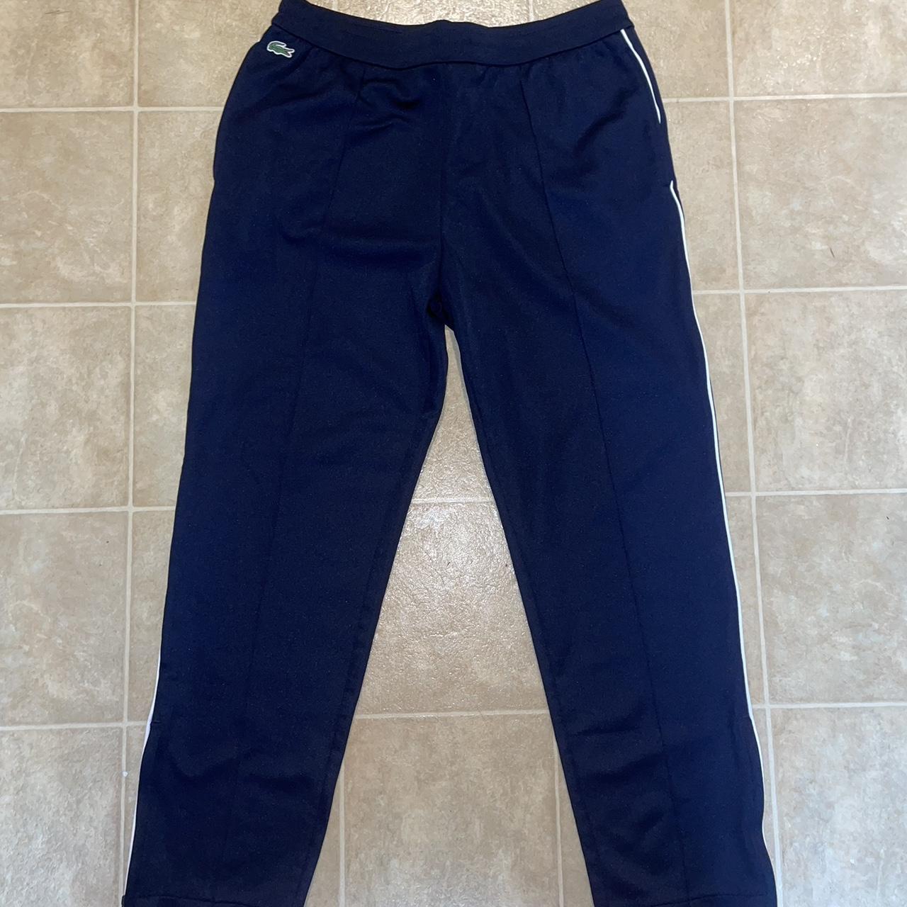 Navy blue Lacoste track pants Size: L worn... - Depop