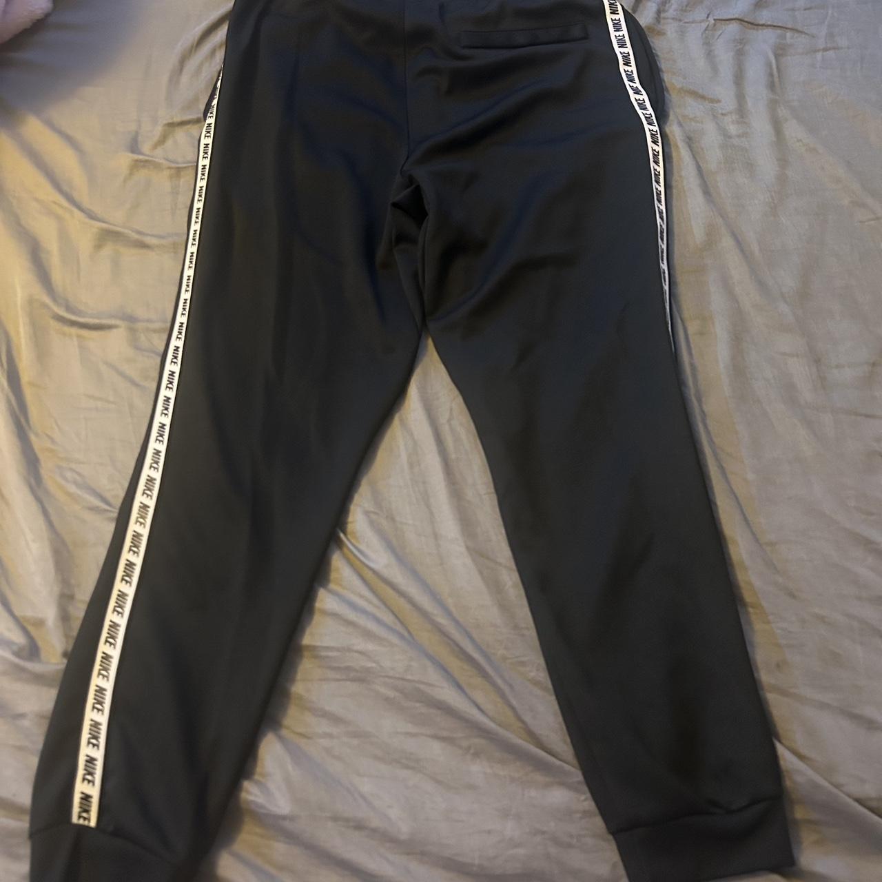 black Nike sweat pants - Depop