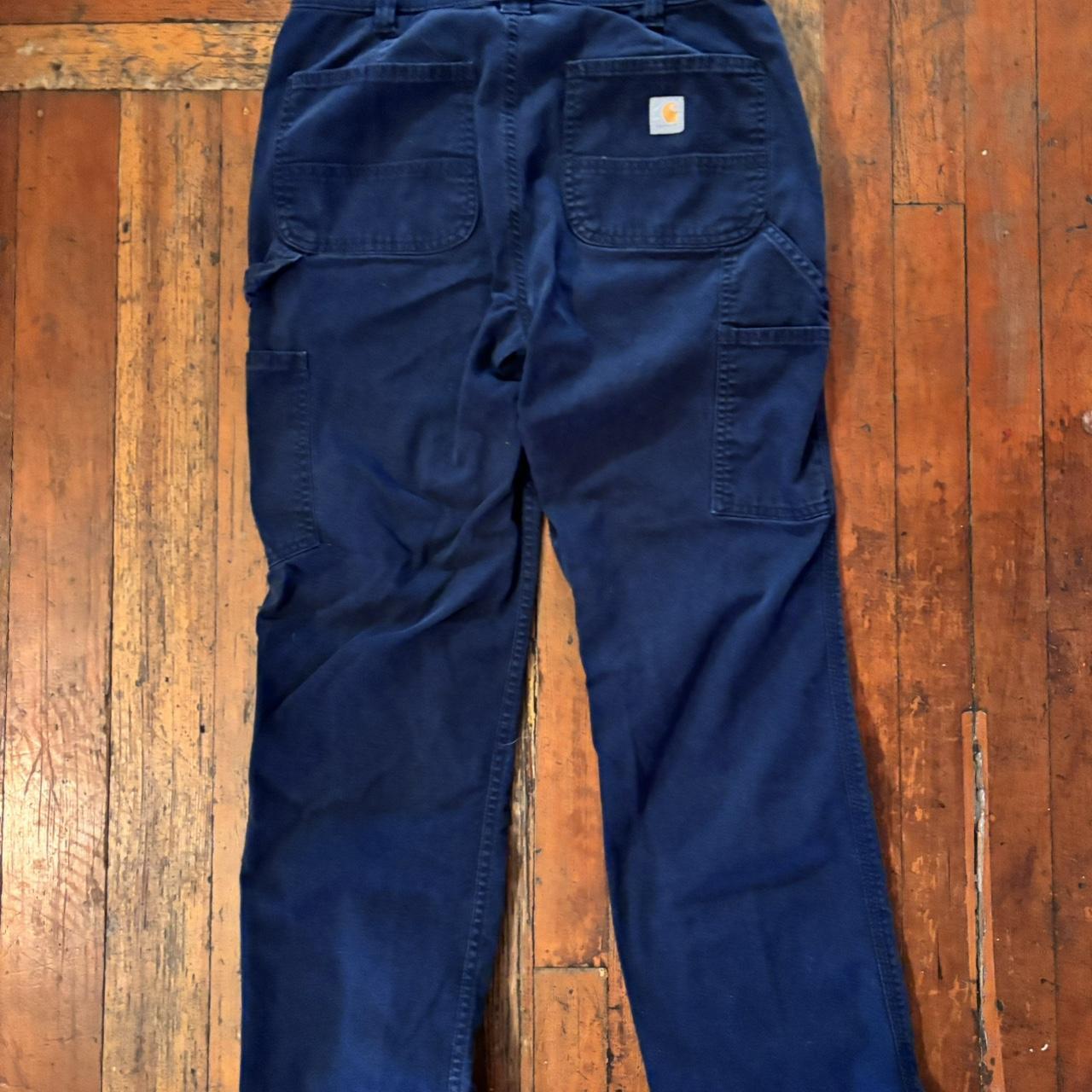 Carhartt navy cargo pants size 4 women’s in really... Depop