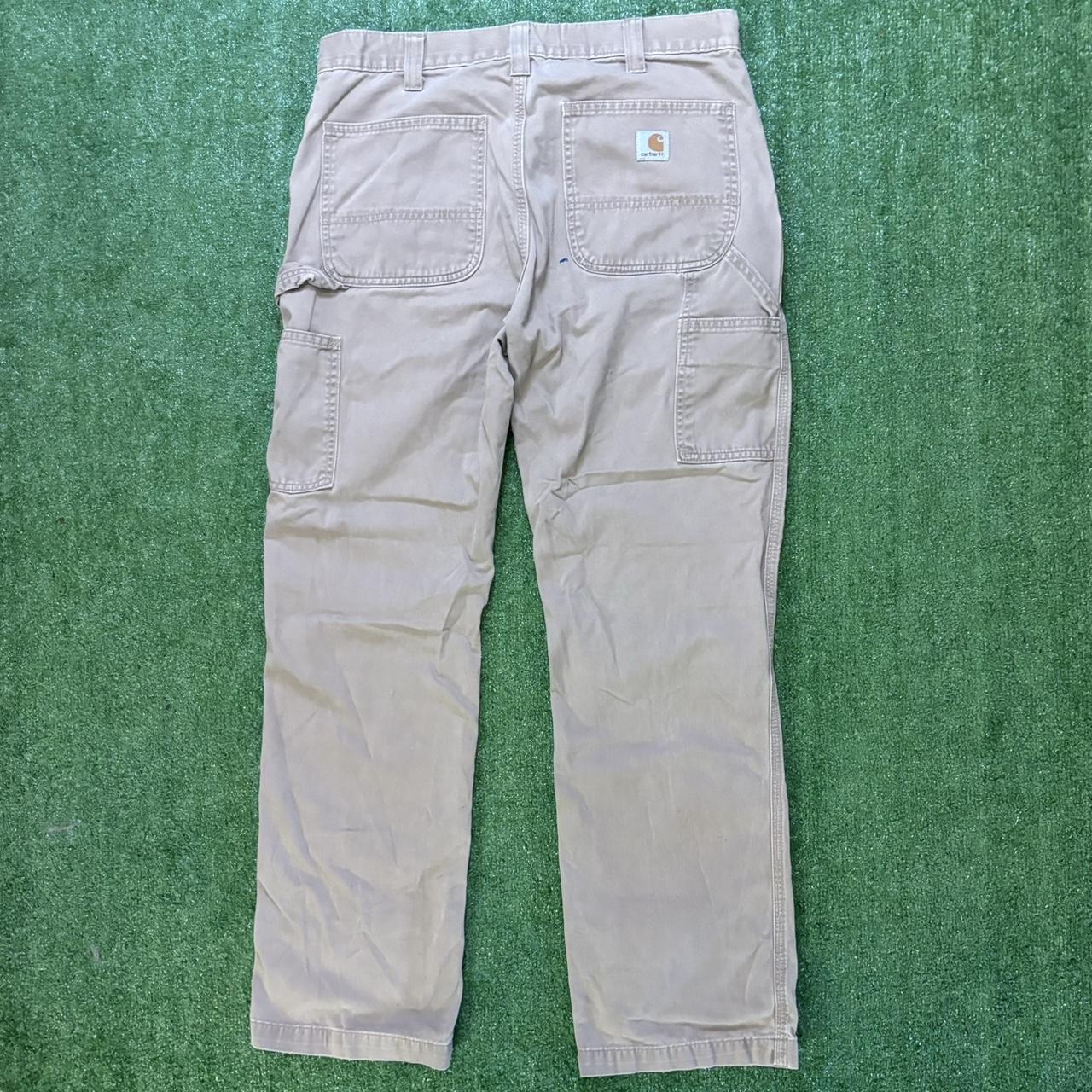 Vintage Carhartt cargo tan pants size 34x32 in... Depop