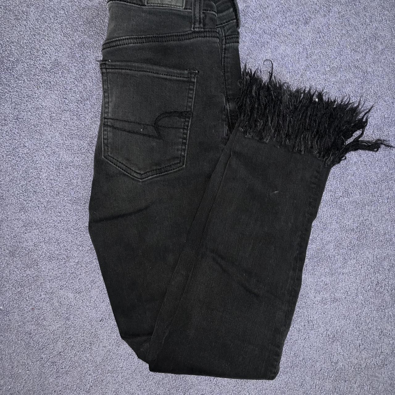 Black high waisted American Eagle jeans with a Depop
