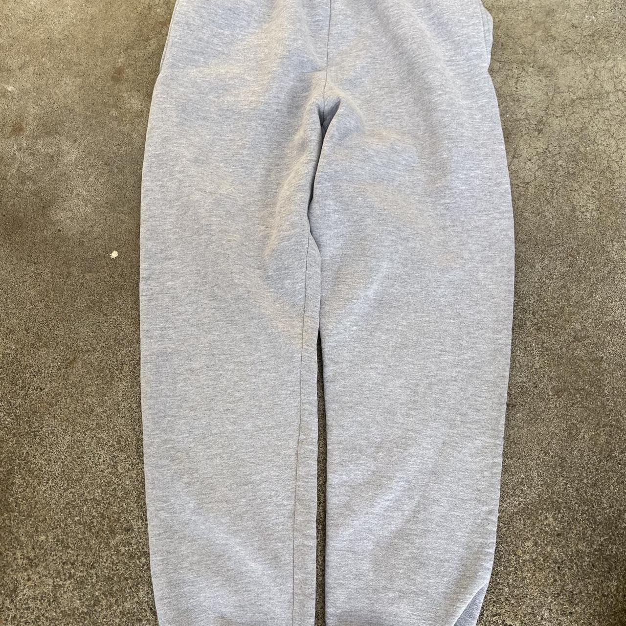 Russel Athletic grey sweatpants Size M Small stain... - Depop