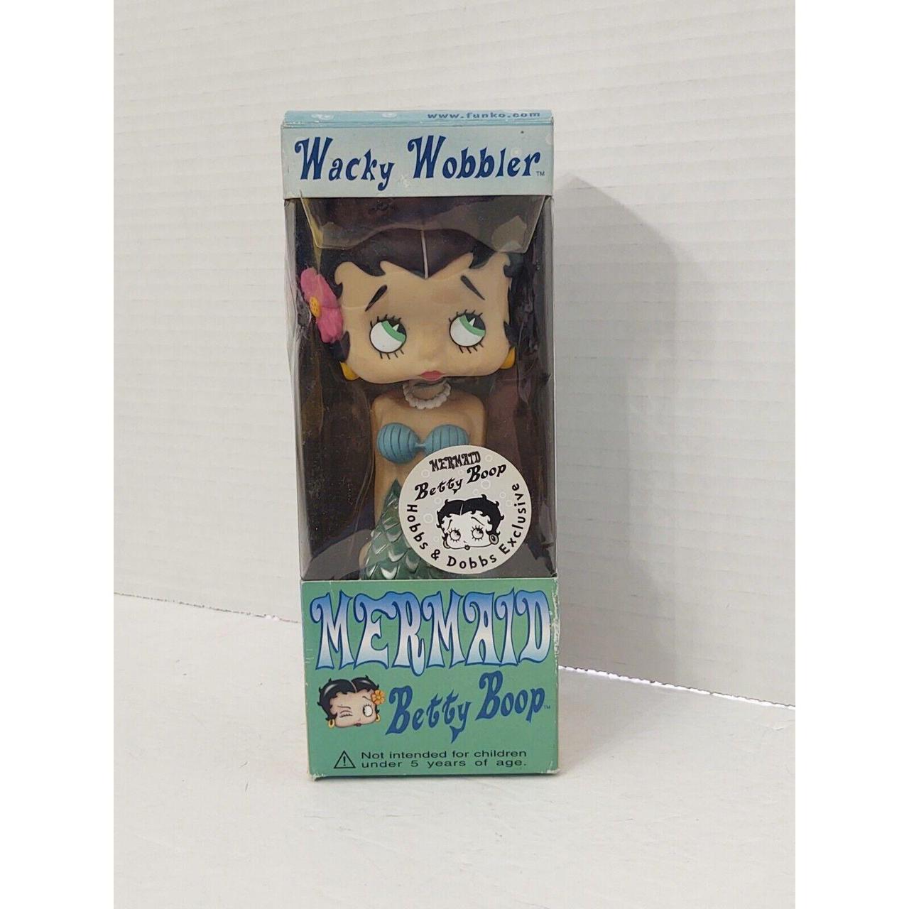 This Funko Wacky Wobbler features the beloved Betty... - Depop