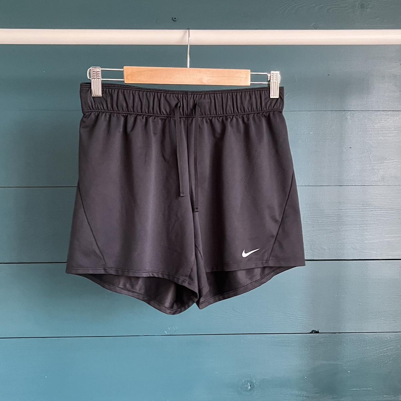 Nike Dri-Fit gold and black floral leggings. Worn - Depop