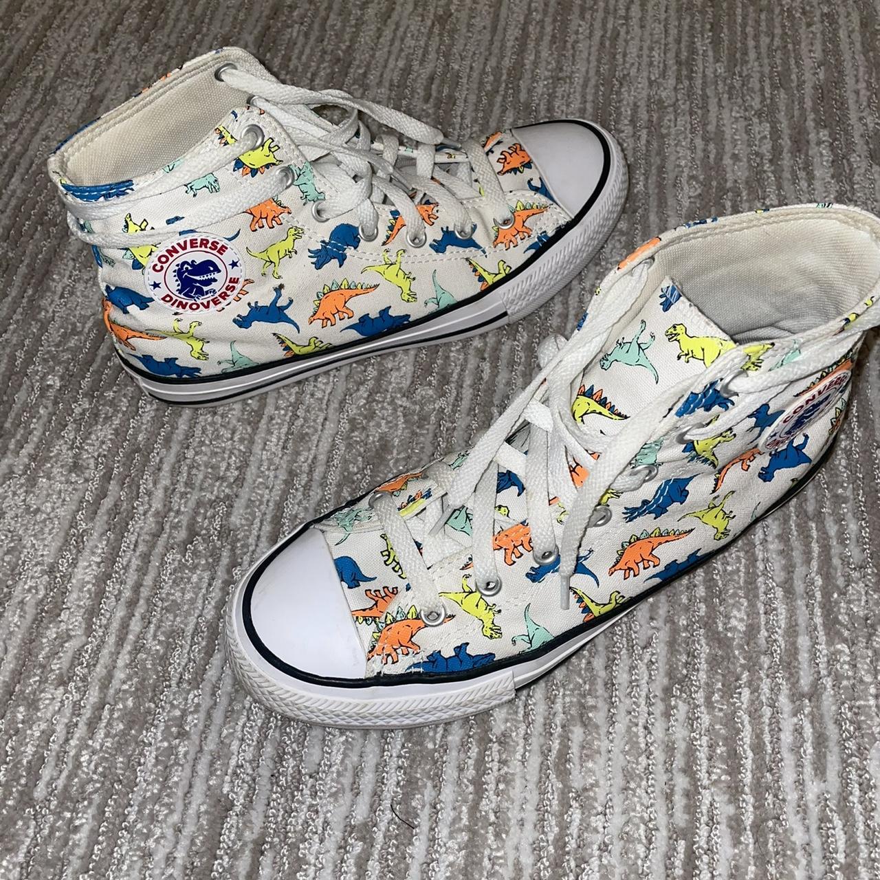 Dinosaur converse Fits a womens