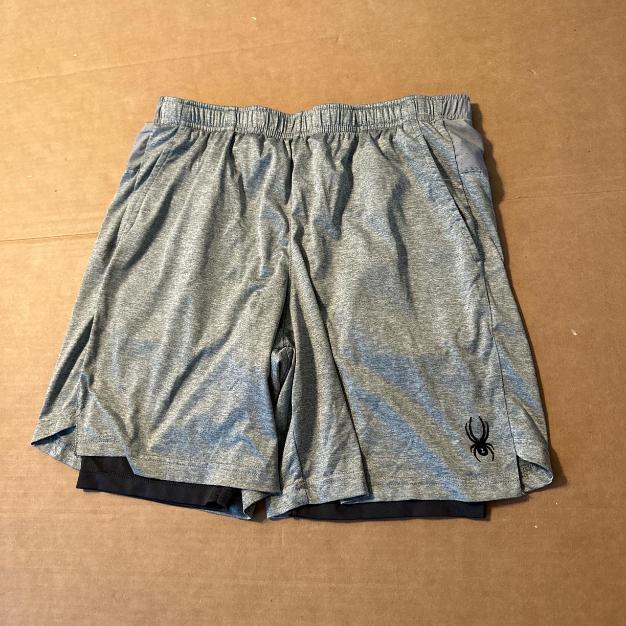 Light grey spyder shorts with compression short... - Depop