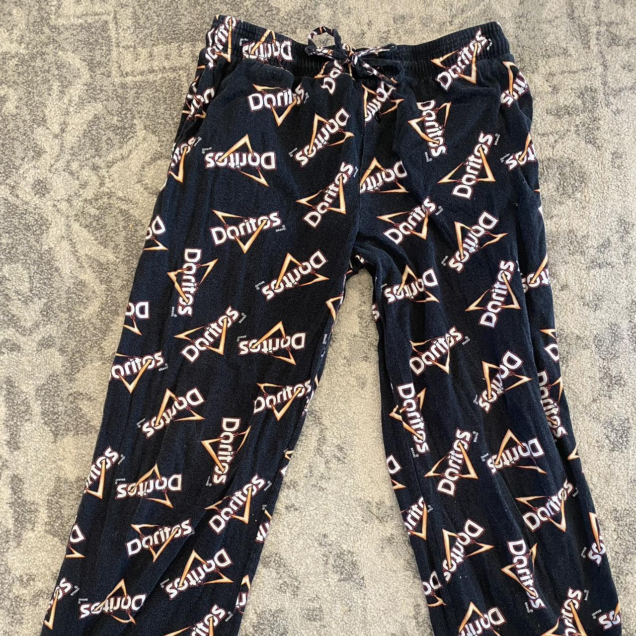 RETRO DORITOS PANTS black with orange and white... - Depop