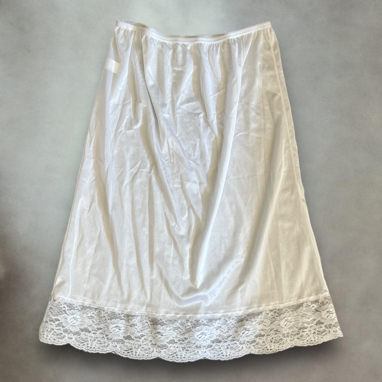 Vintage white midi slip skirt with lace detailing at... - Depop