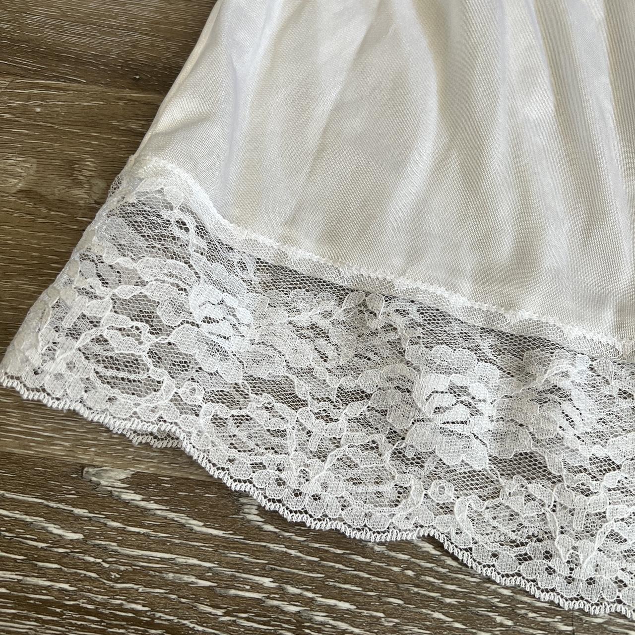 Vintage white midi slip skirt with lace detailing at... - Depop