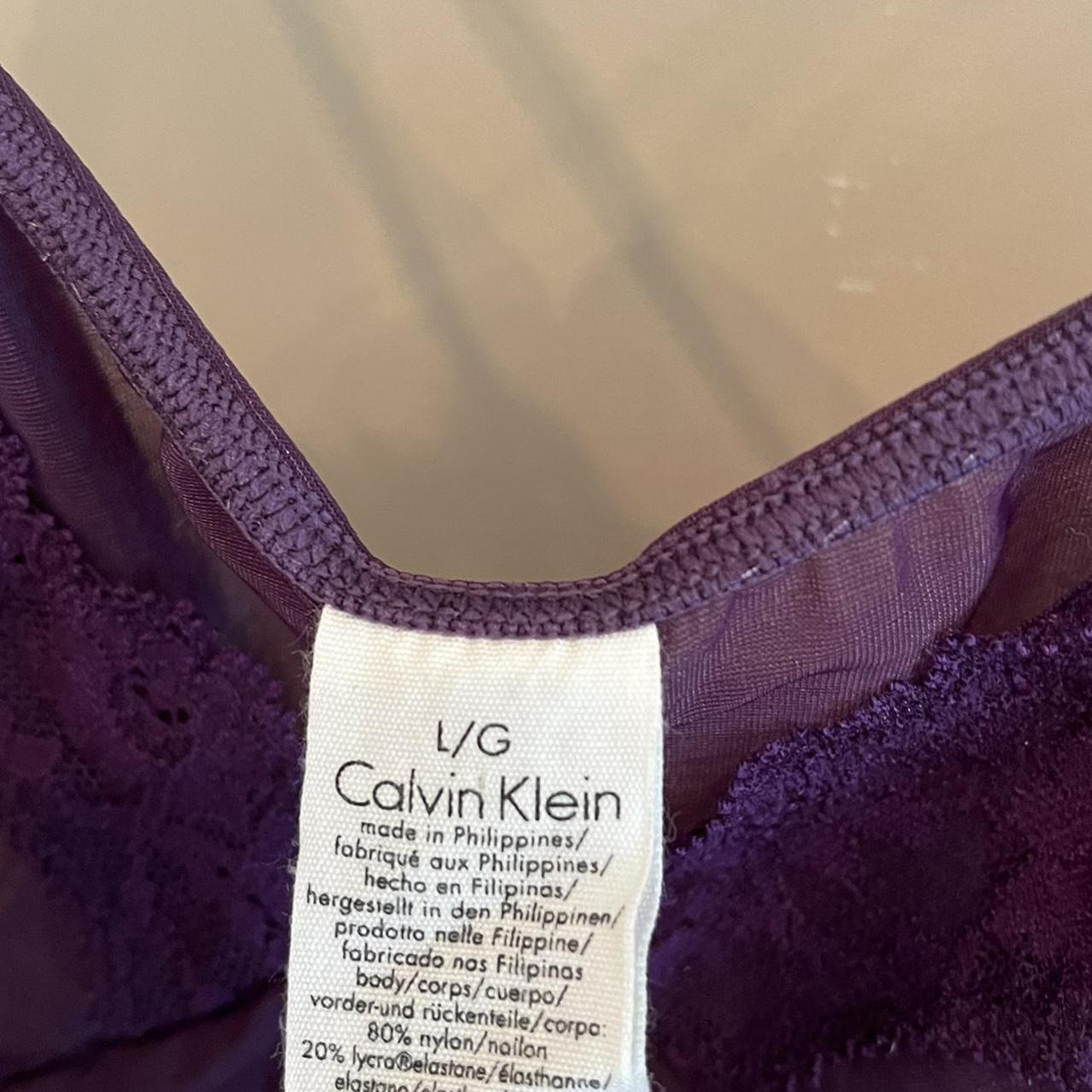 Calvin Klein Purple lacey Top Large, but as you can... Depop