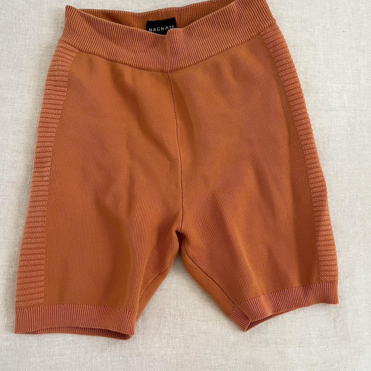 Nagnata orange hot sale shorts