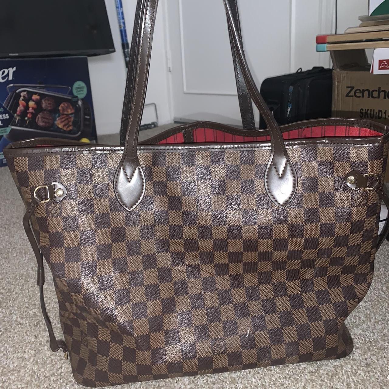 Louis Vuitton woman’s purse, some scuff marks on the... Depop
