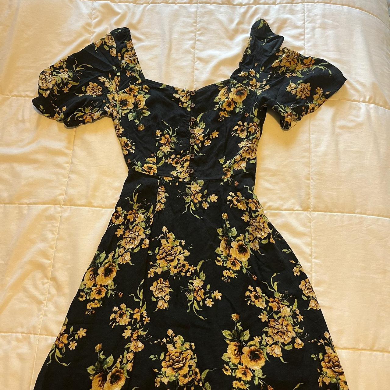 Black dress with yellow flowers worn only a few times