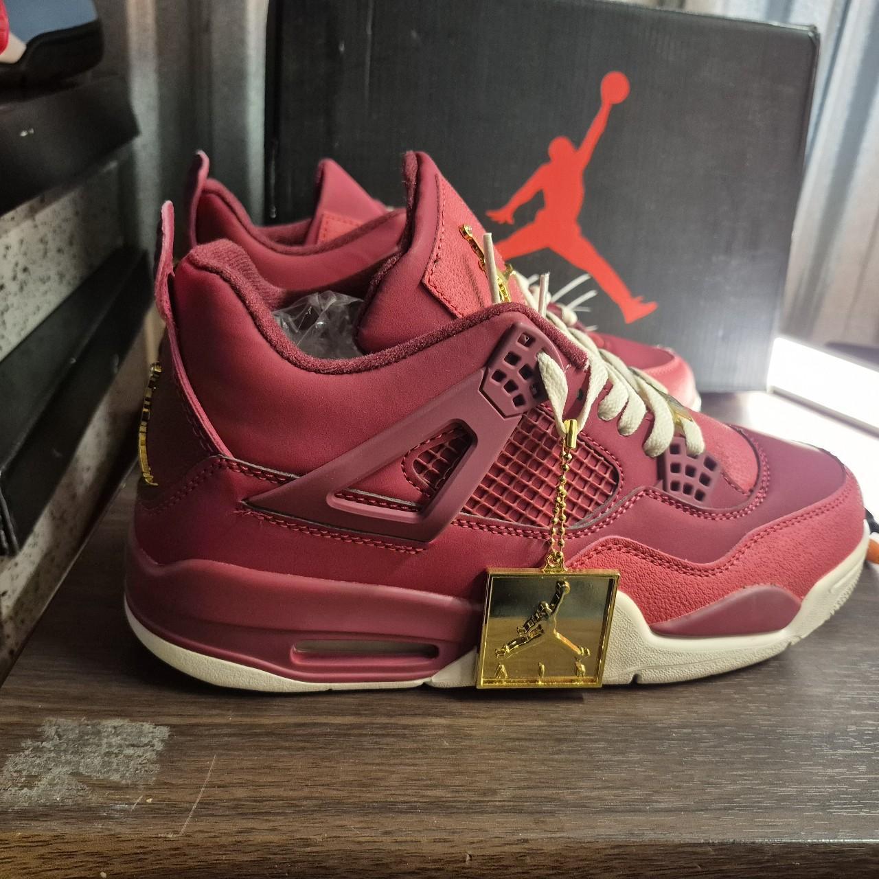 burgundy gold jordans