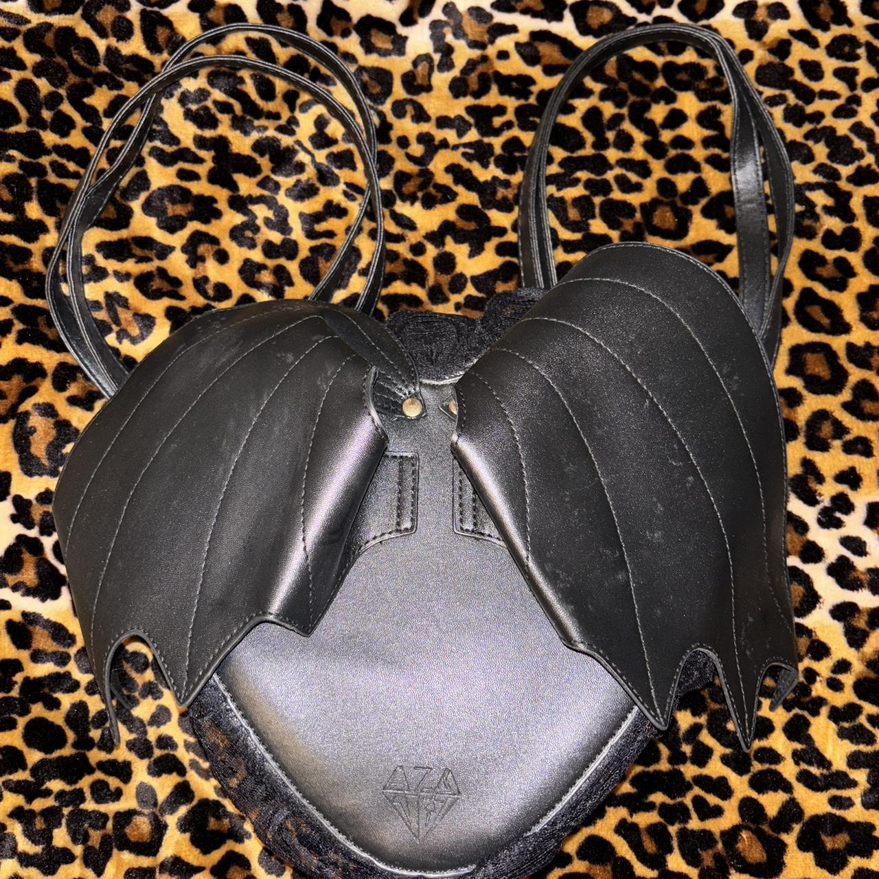 Bat shaped online purse