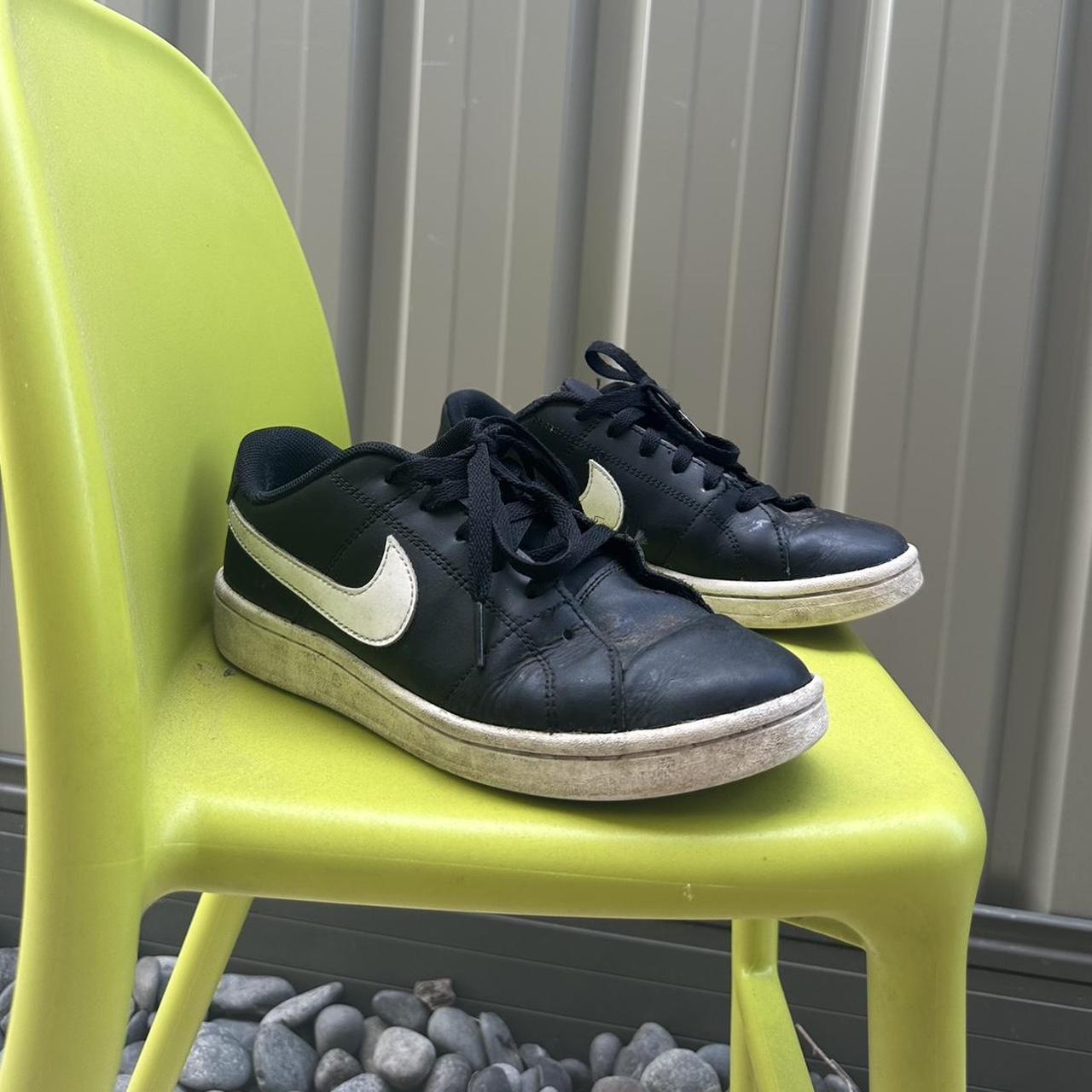 half black and white nike shoes