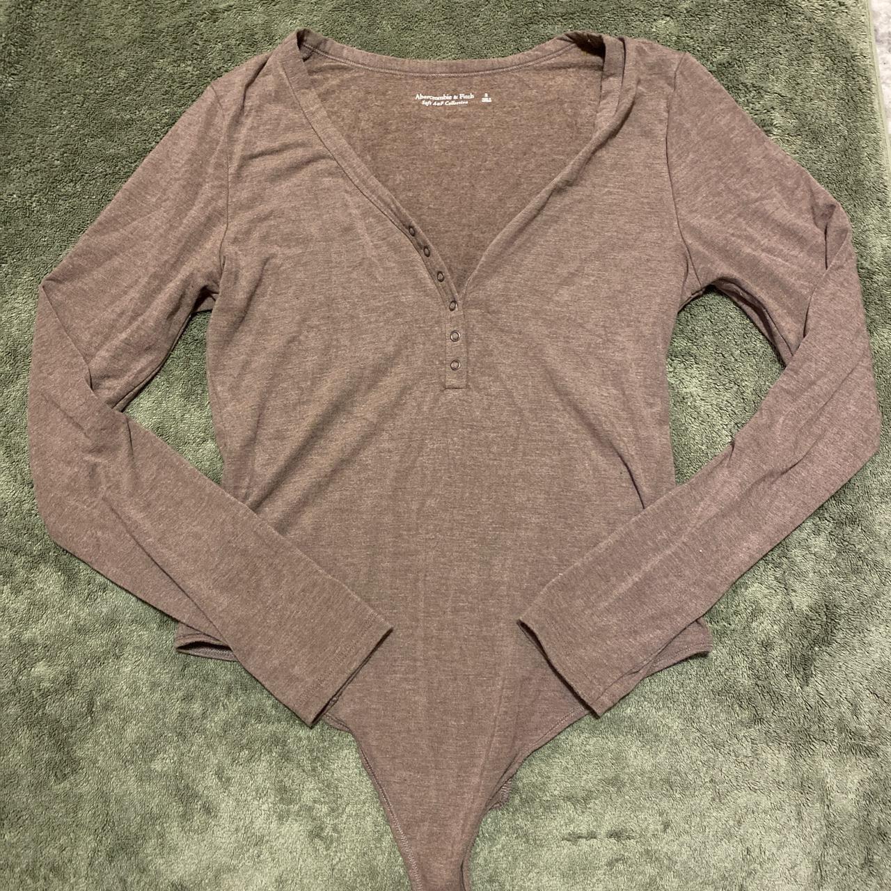 Brown V Neck Bodysuit Buttons at the bottom - Depop