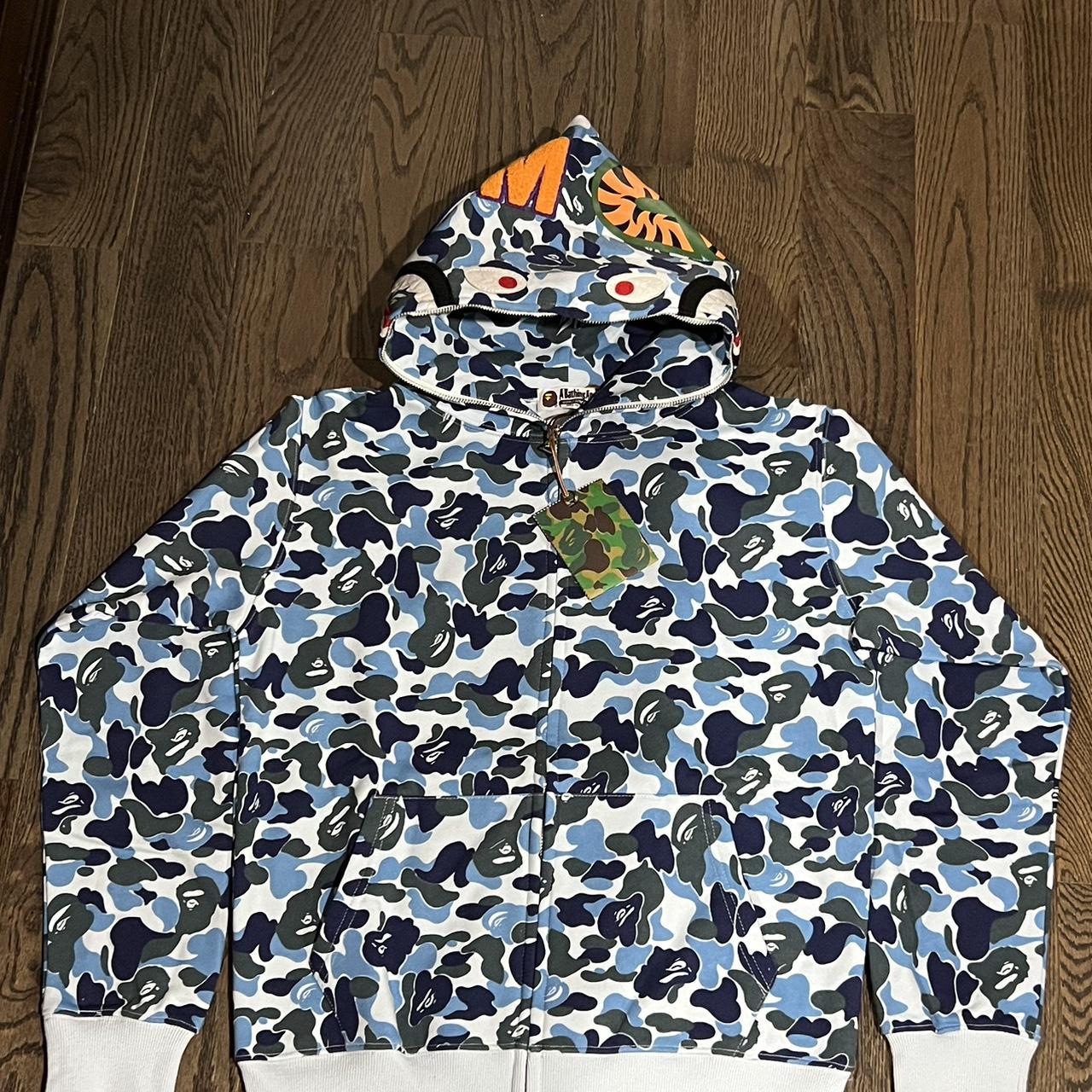 Blue Bape Hoodie
 AUTHENTIC WITH RECEIPT BLUE BAPE HOODIE LMK IF Depop