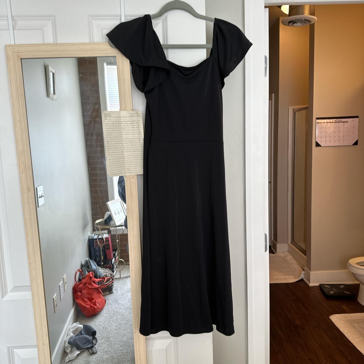 Elegant mid length black dress with flutter sleeves - Depop