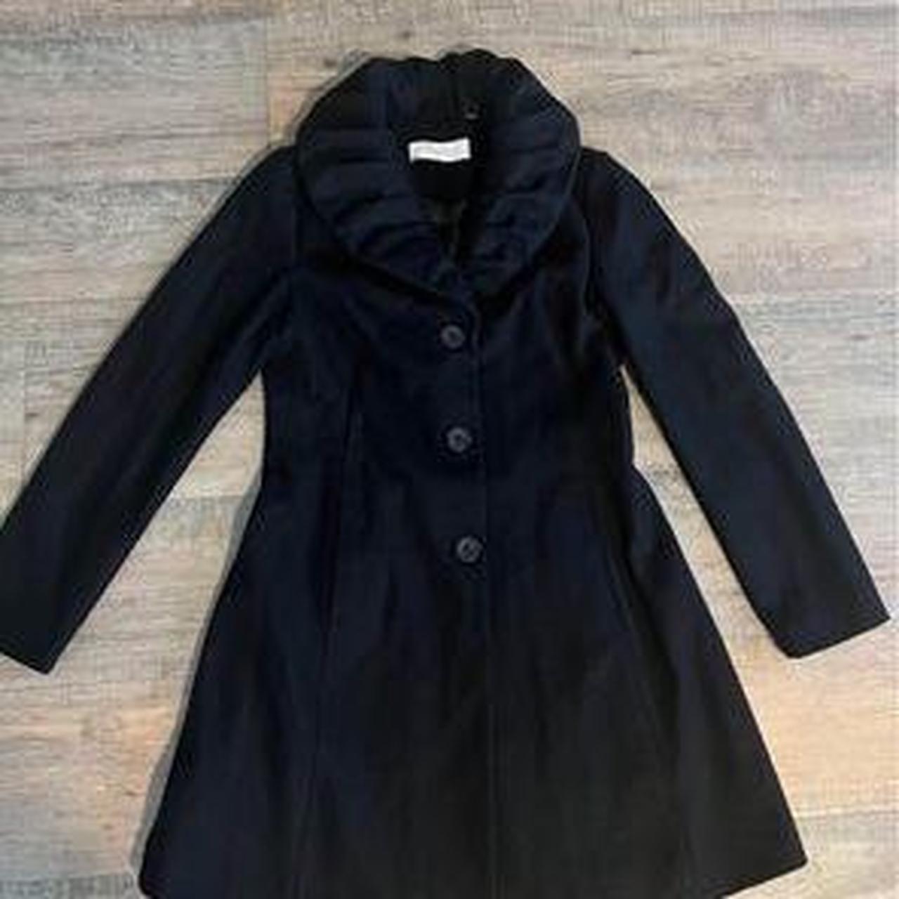 Black wool coat with ruffle collar and long sleeves. Depop