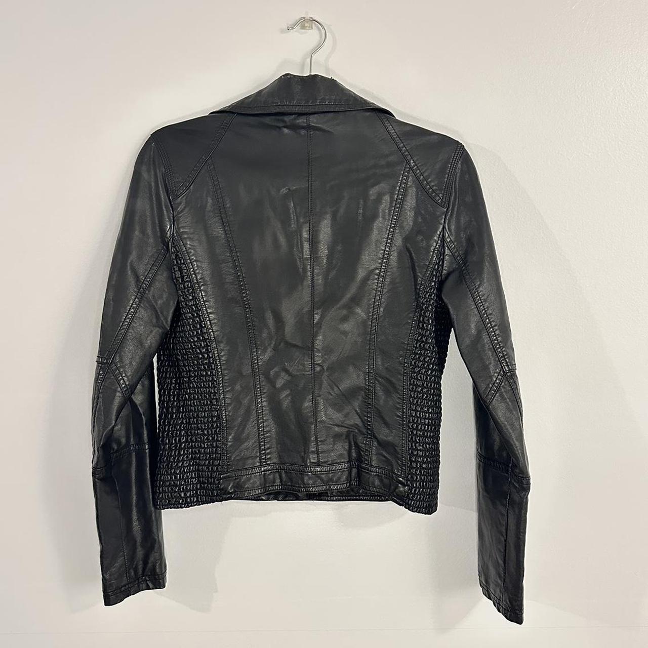 Black faux leather jacket. Size L. Signs of wear on... - Depop