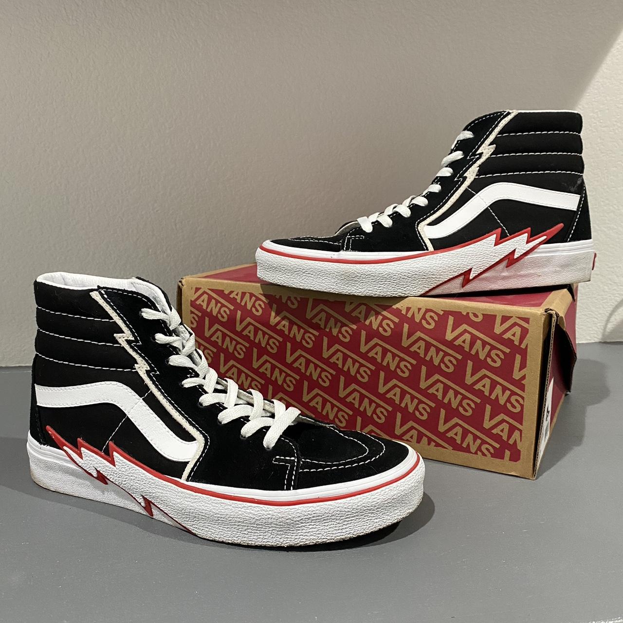 Black shops racing red vans