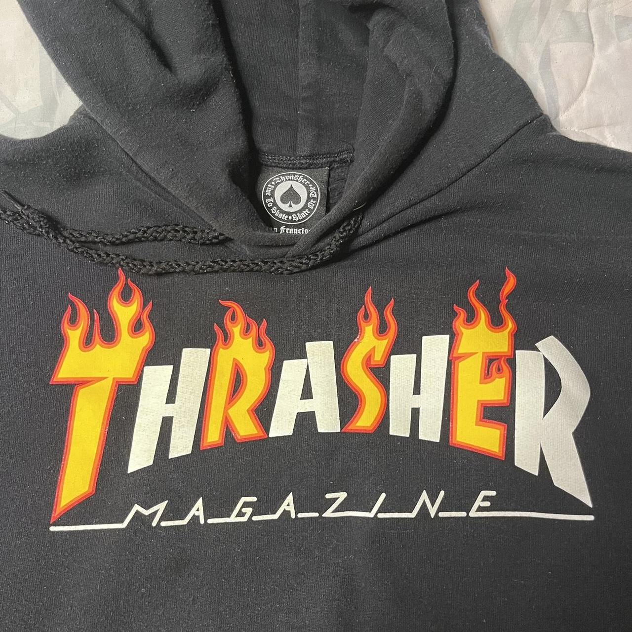 Black orange and white flame thrasher hoodie. Size