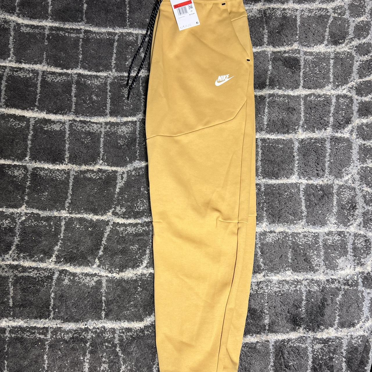 Nike Mens Size L Slim Fit Tapered Leg Pants Cream... Depop