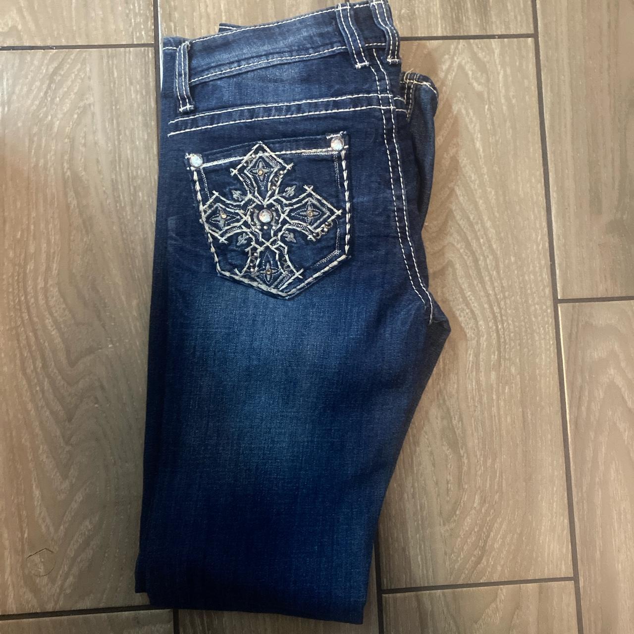 distressed cross rhinestone design flare jeans have... - Depop