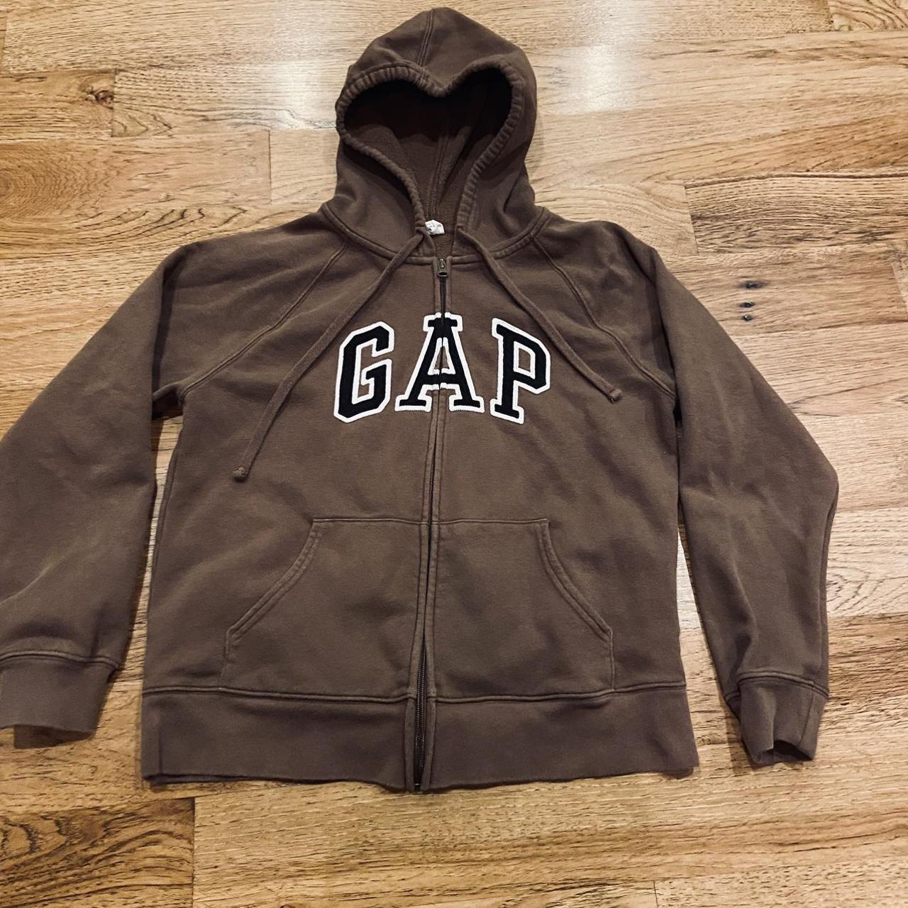 Brown Gap Hoodie
 Women’s brown gap hoo size medium fits a men’s Depop