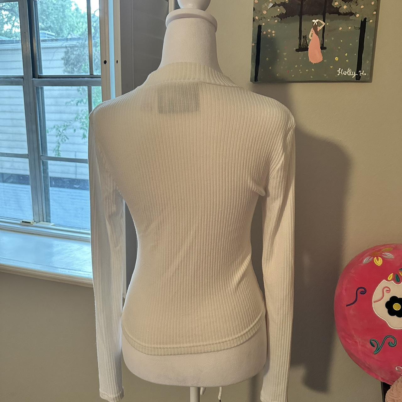 White ribbed long sleeve top with a heart shaped... - Depop
