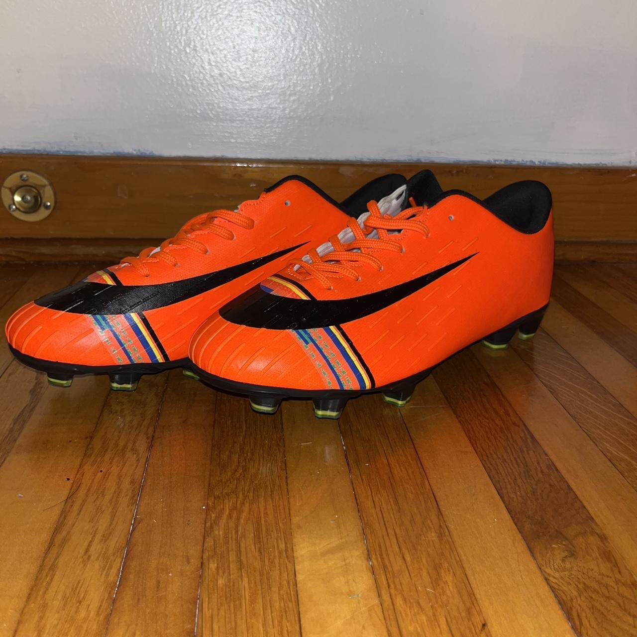 mens orange football cleats